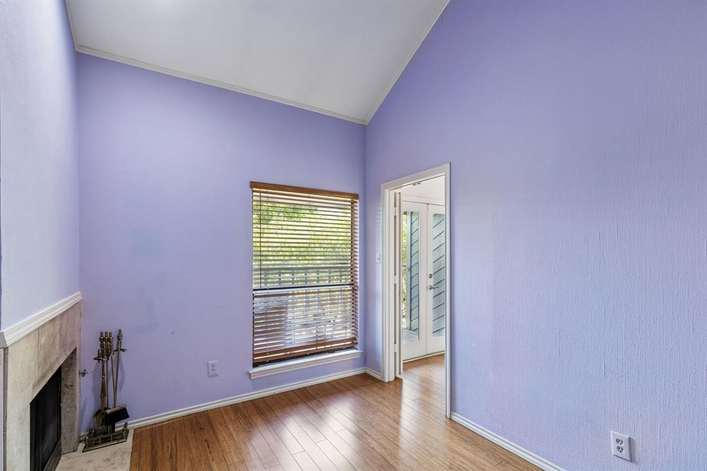 6502 Riverview Lane Dallas, TX 75248 - Photo 21 of 40 Attached to the primary bedroom with a see-through fireplace, this room is multi-purpose