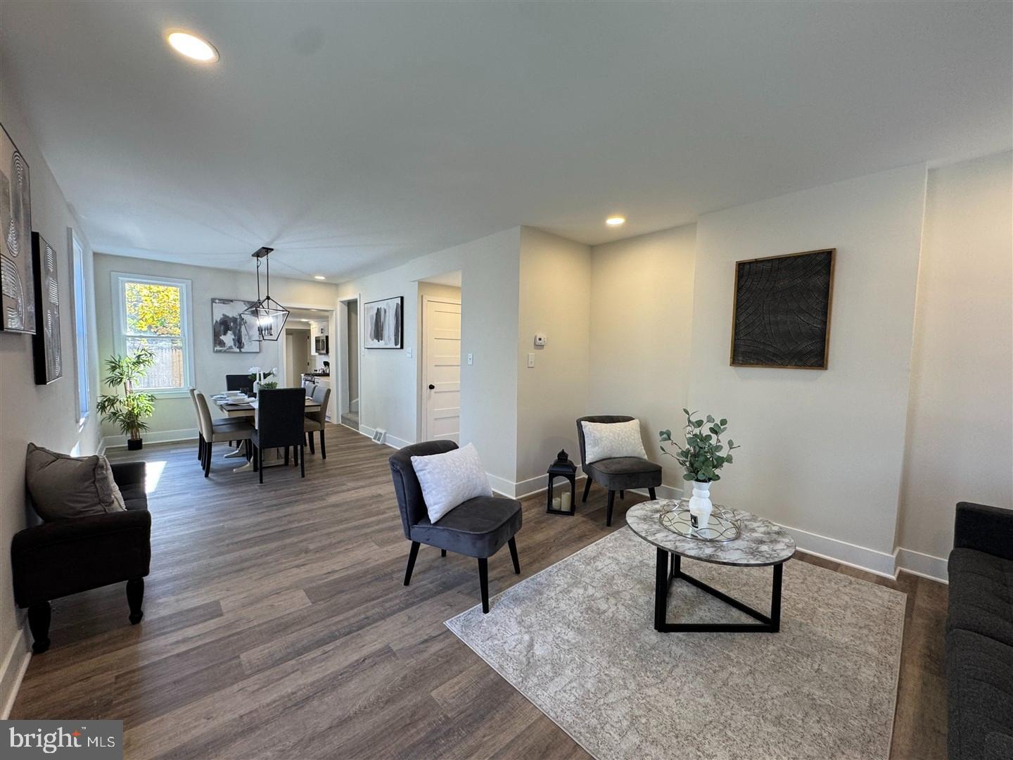 66 East 3rd Street Moorestown, NJ 08057 - Photo 11 of 33 a living room with furniture and a wooden floor