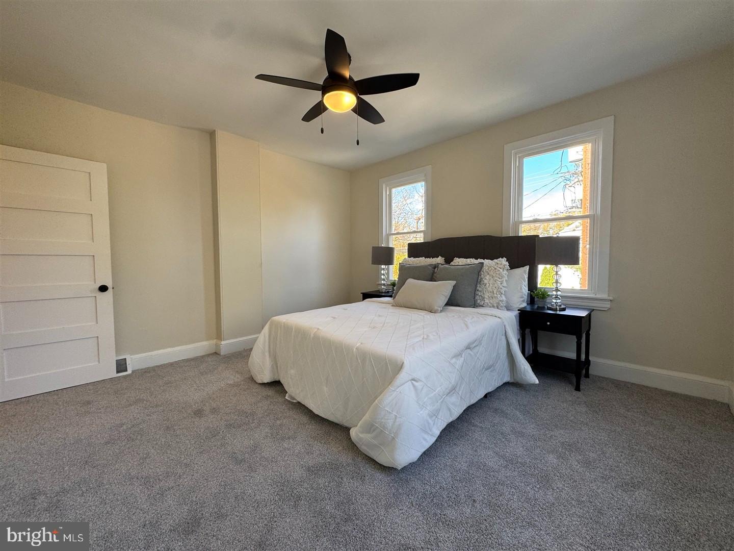 66 East 3rd Street Moorestown, NJ 08057 - Photo 21 of 33 a bedroom with a bed and a ceiling fan