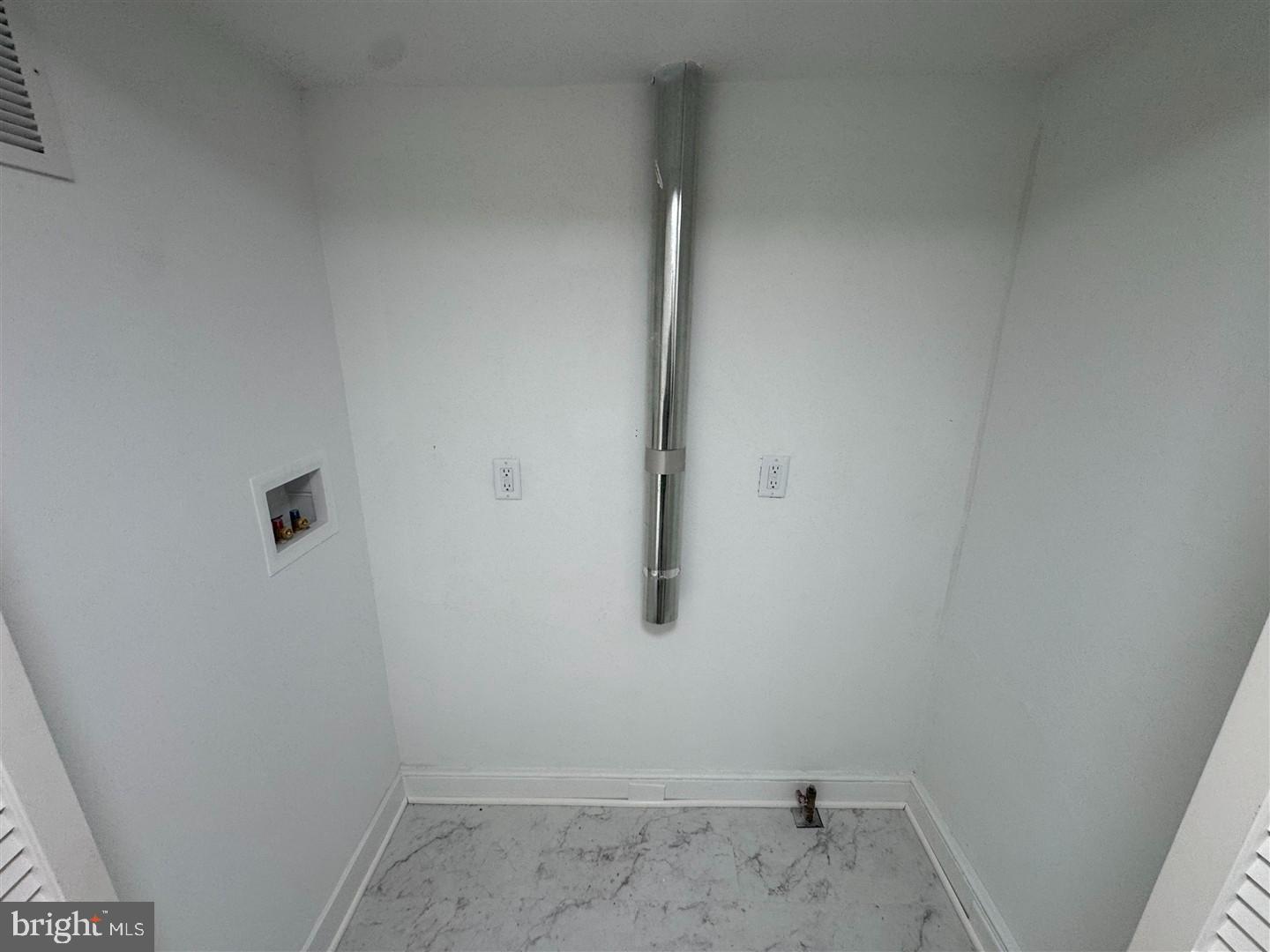 66 East 3rd Street Moorestown, NJ 08057 - Photo 28 of 33 close up of a white marble wall