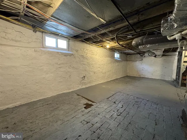 a view of multiple houses with a yard