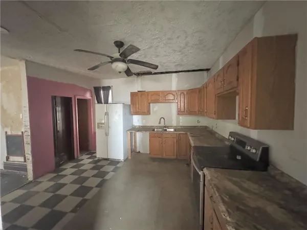 a kitchen with a cabinets and counter space