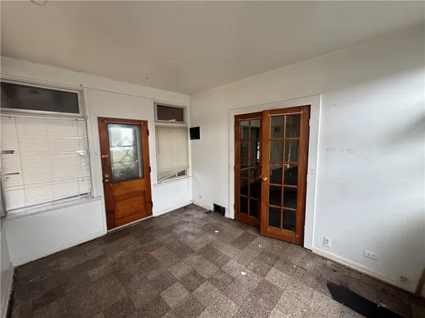 an empty room with window