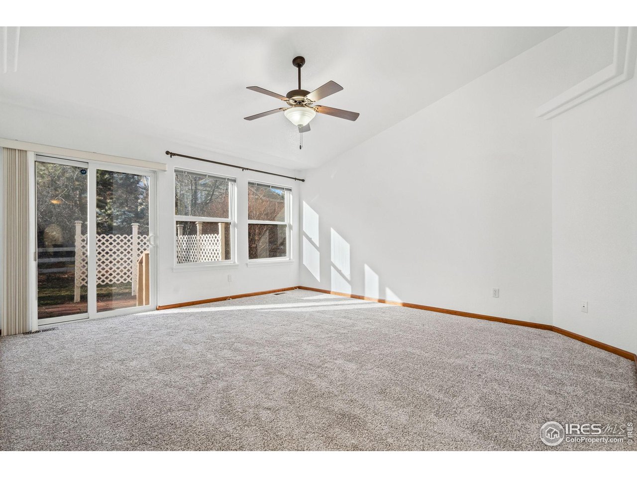 2239 Muir Lane Fort Collins, CO 80524 - Photo 13 of 31 a view of empty room with windows