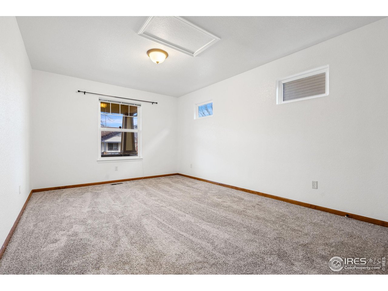 2239 Muir Lane Fort Collins, CO 80524 - Photo 17 of 31 a view of an empty room with window