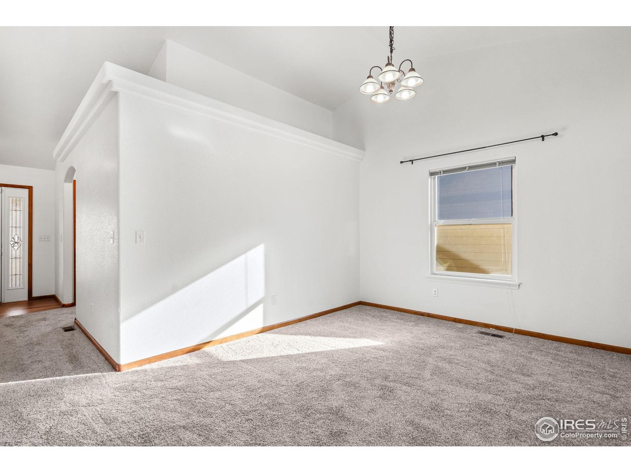 2239 Muir Lane Fort Collins, CO 80524 - Photo 9 of 31 a view of an empty room with a window