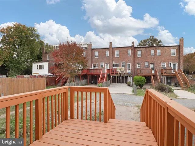 a view of a house with a roof deck