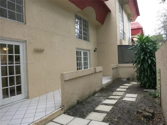 a car parked in front of a house