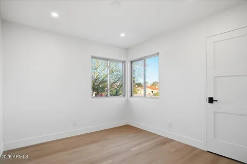 an empty room with windows