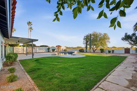 a view of a balcony with a trees