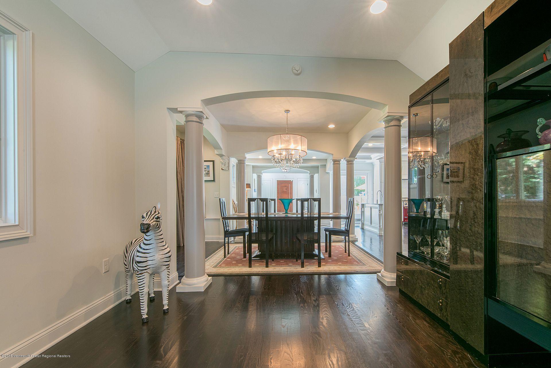 75 Seven Bridges Road Little Silver, NJ 07739 - Photo 25 of 43 a view of a dining room with furniture window and wooden floor
