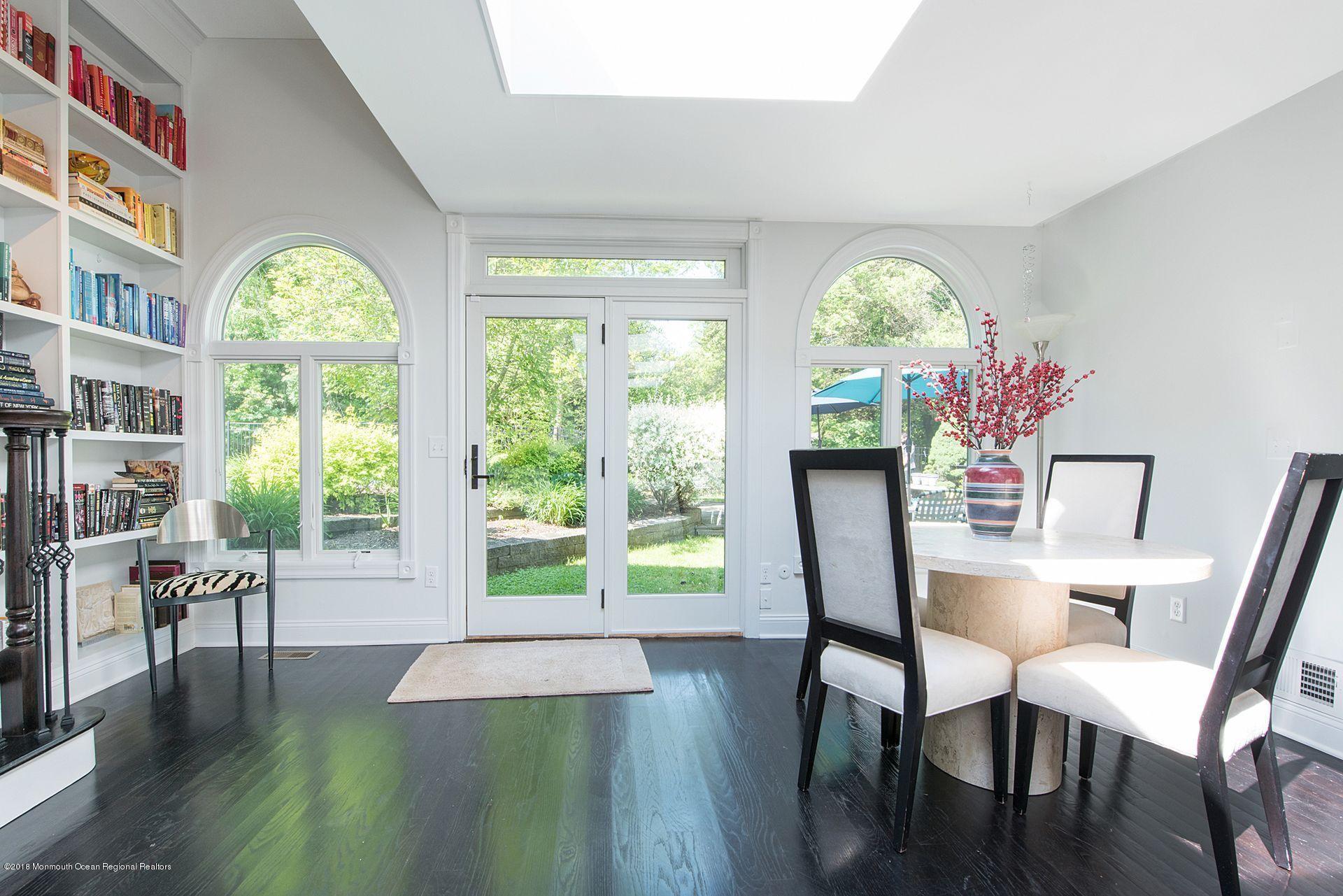 75 Seven Bridges Road Little Silver, NJ 07739 - Photo 26 of 43 a view of a dining room with furniture window and wooden floor