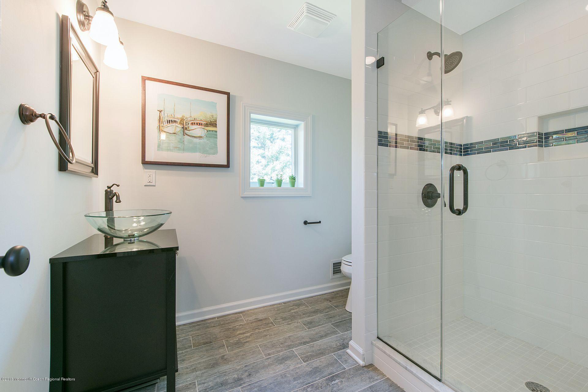 75 Seven Bridges Road Little Silver, NJ 07739 - Photo 34 of 43 a bathroom with a shower