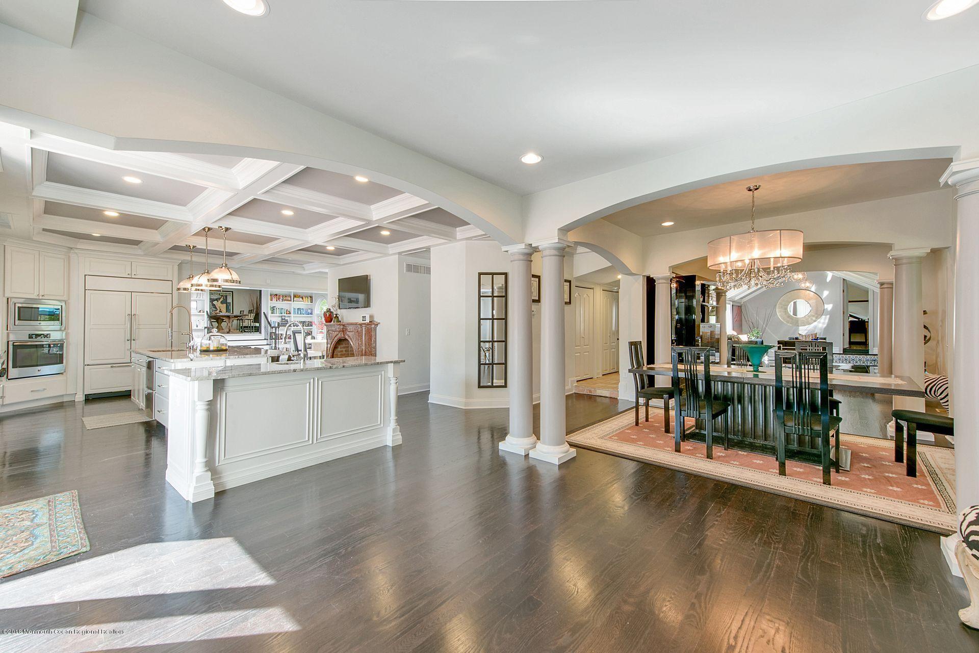 75 Seven Bridges Road Little Silver, NJ 07739 - Photo 43 of 43 a view of a living room and chandelier with furniture