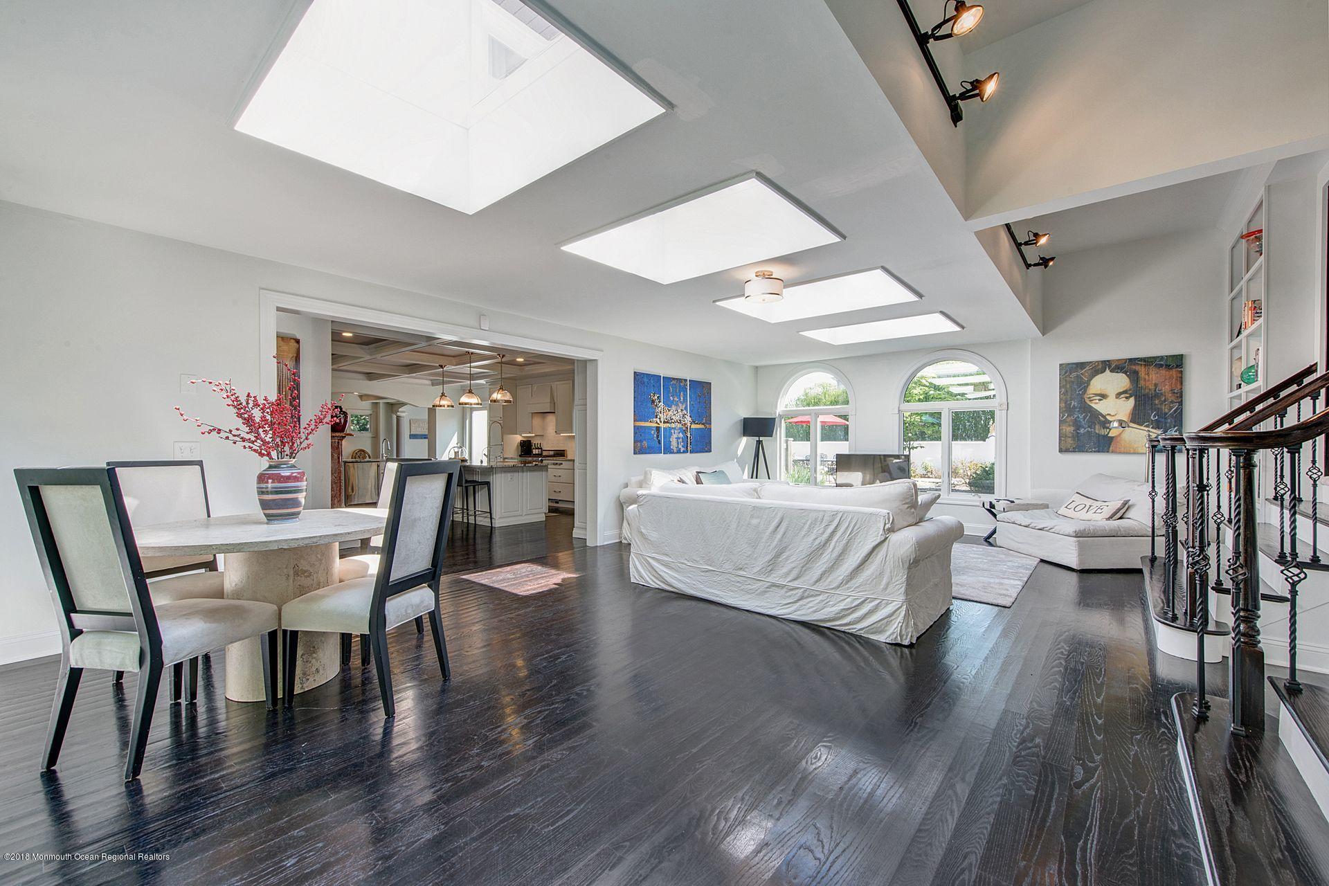 75 Seven Bridges Road Little Silver, NJ 07739 - Photo 5 of 43 a living room with furniture and a wooden floor