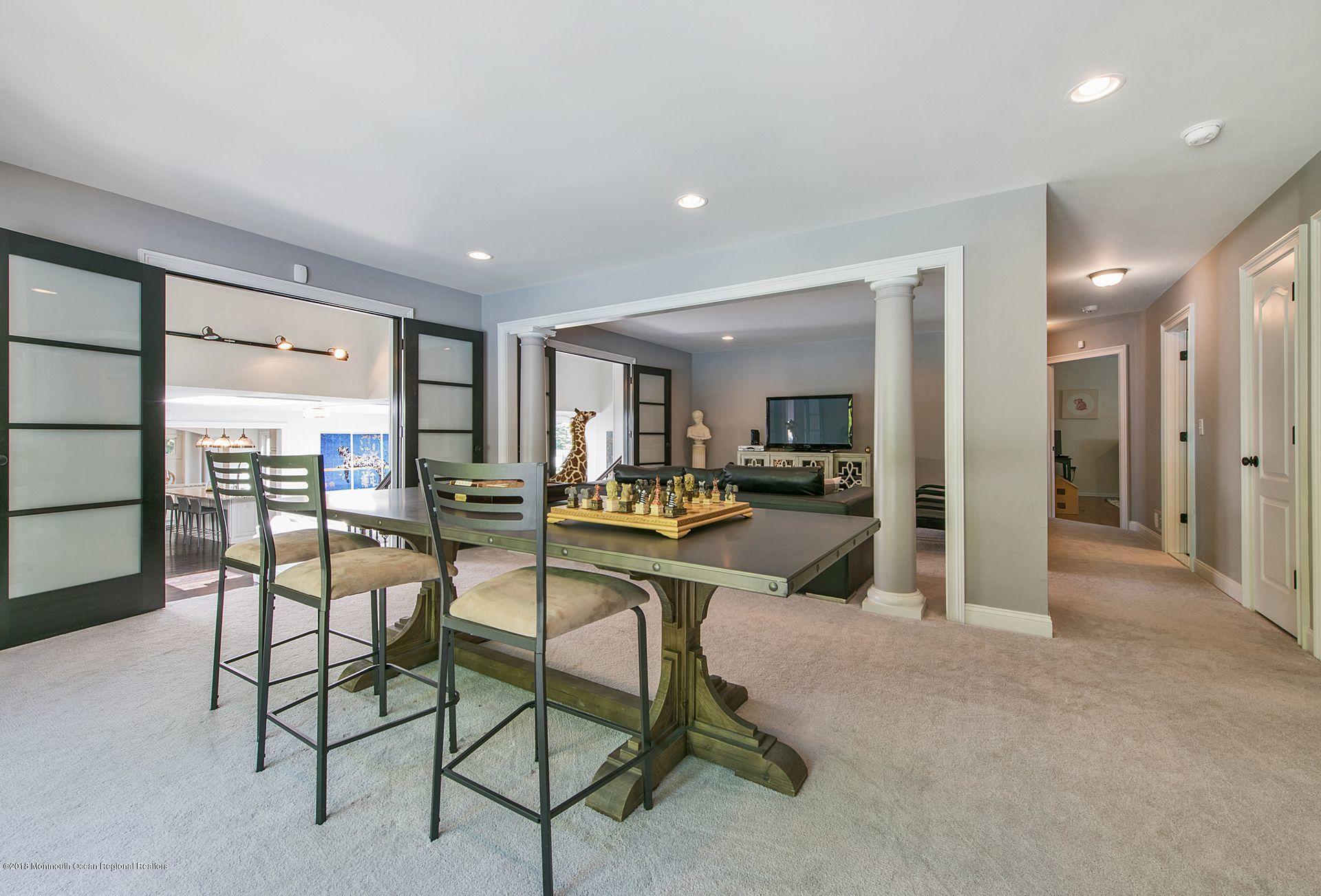 75 Seven Bridges Road Little Silver, NJ 07739 - Photo 9 of 43 a view of a dining room with furniture