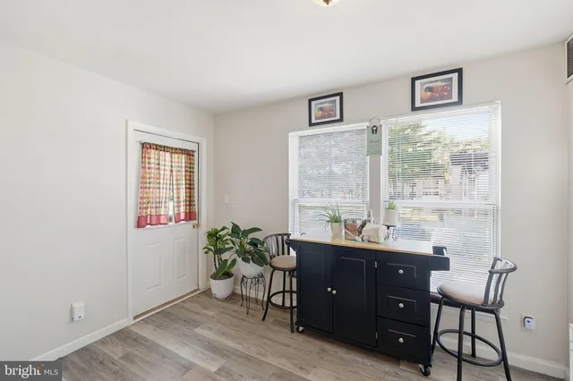 a room with a table and a window