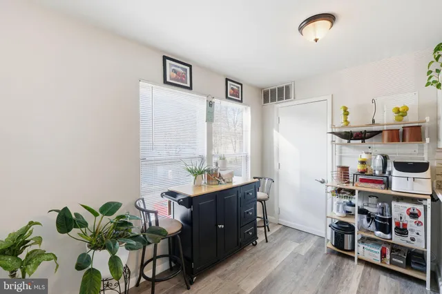 a view of a street with sitting area