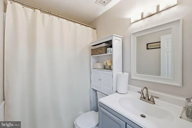 a view of a hallway with washer and dryer