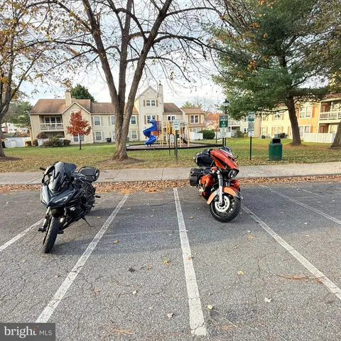a view of lake with a yard