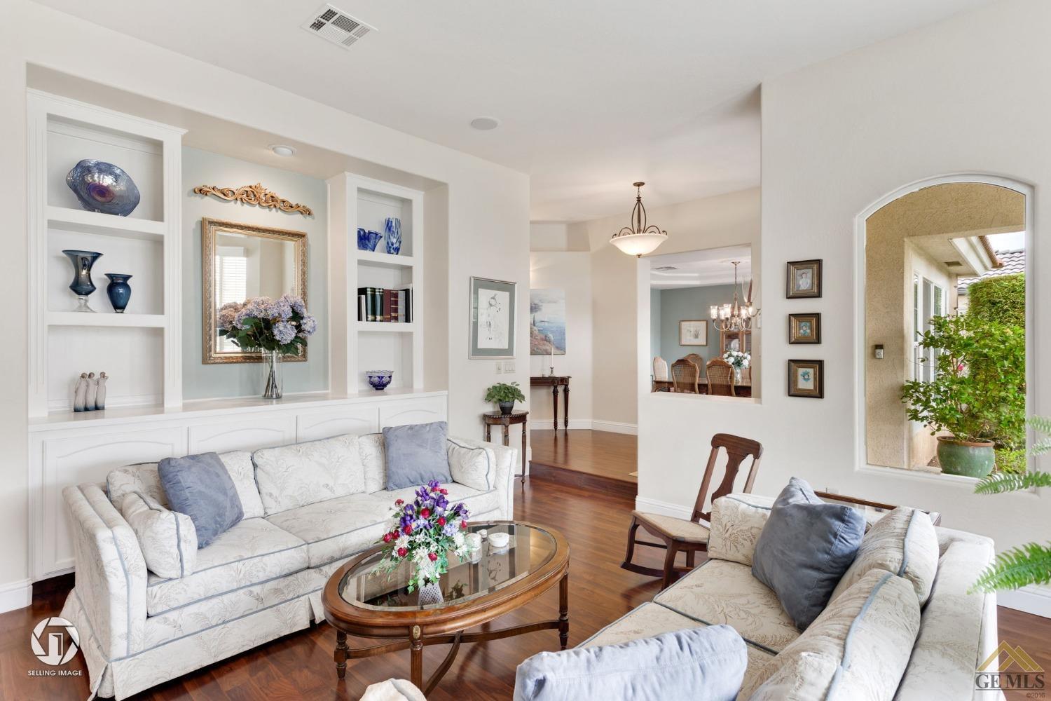 Undisclosed Address Bakersfield, CA 93311 - Photo 13 of 51 a living room with furniture and wooden floor