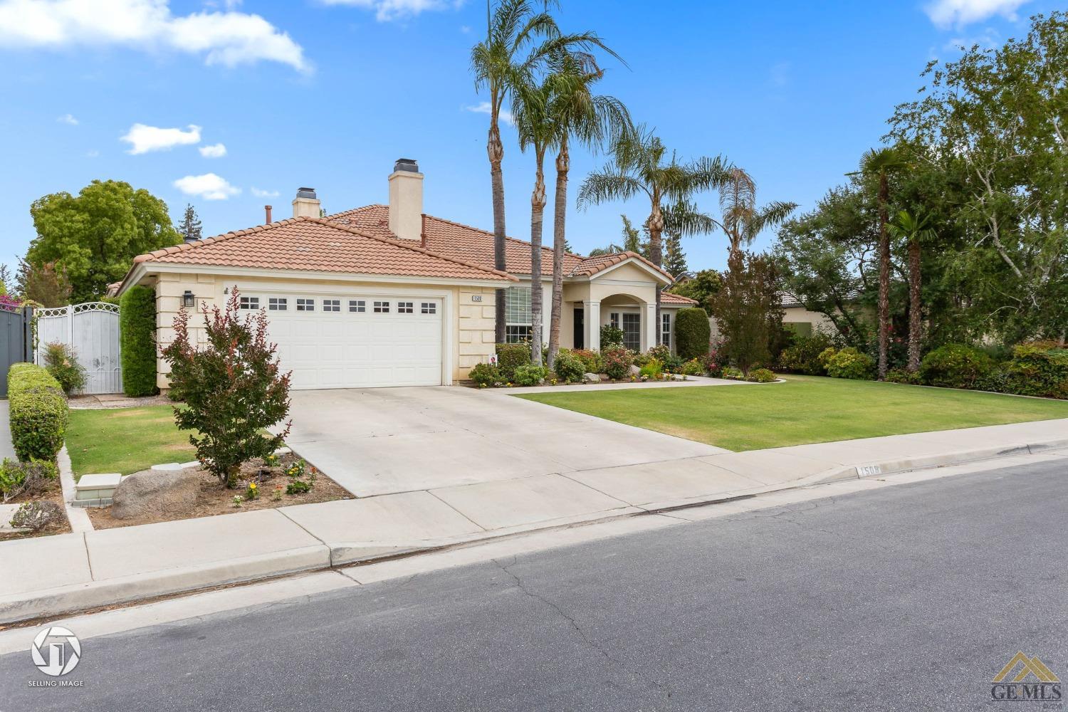 Undisclosed Address Bakersfield, CA 93311 - Photo 2 of 51 a front view of a house with garden