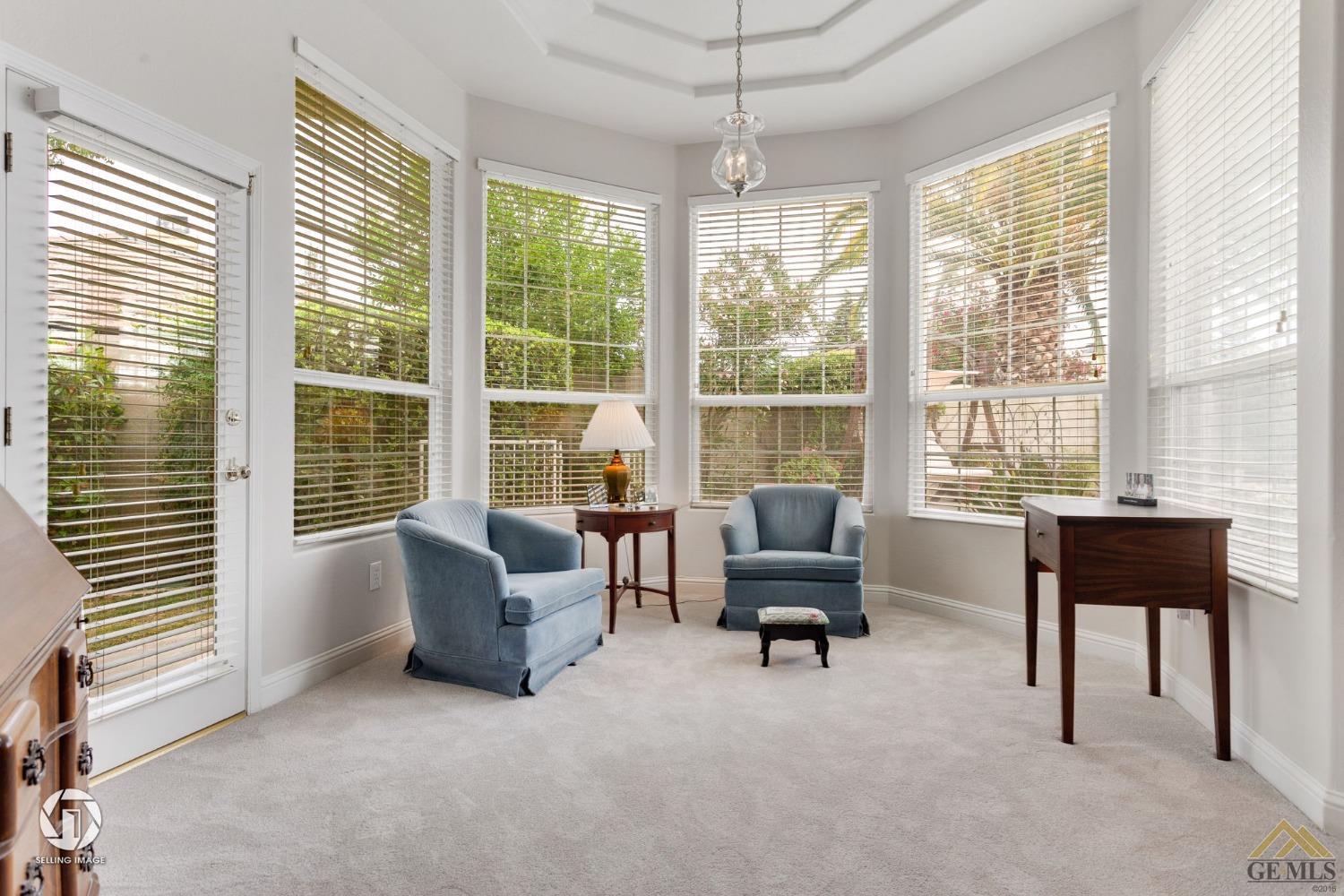 Undisclosed Address Bakersfield, CA 93311 - Photo 29 of 51 a living room with furniture and a large window