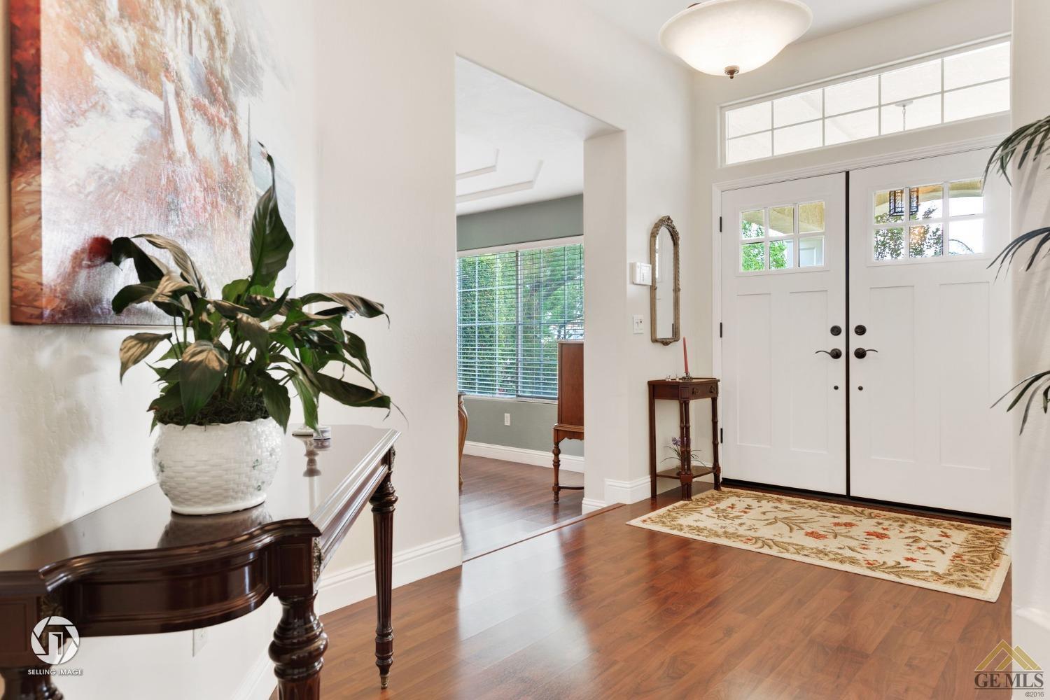Undisclosed Address Bakersfield, CA 93311 - Photo 7 of 51 a view of living room with furniture and a potted plant