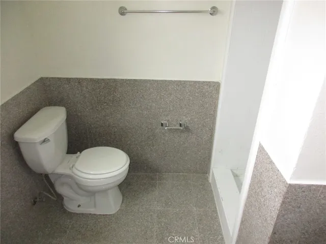 a bathroom with a toilet
