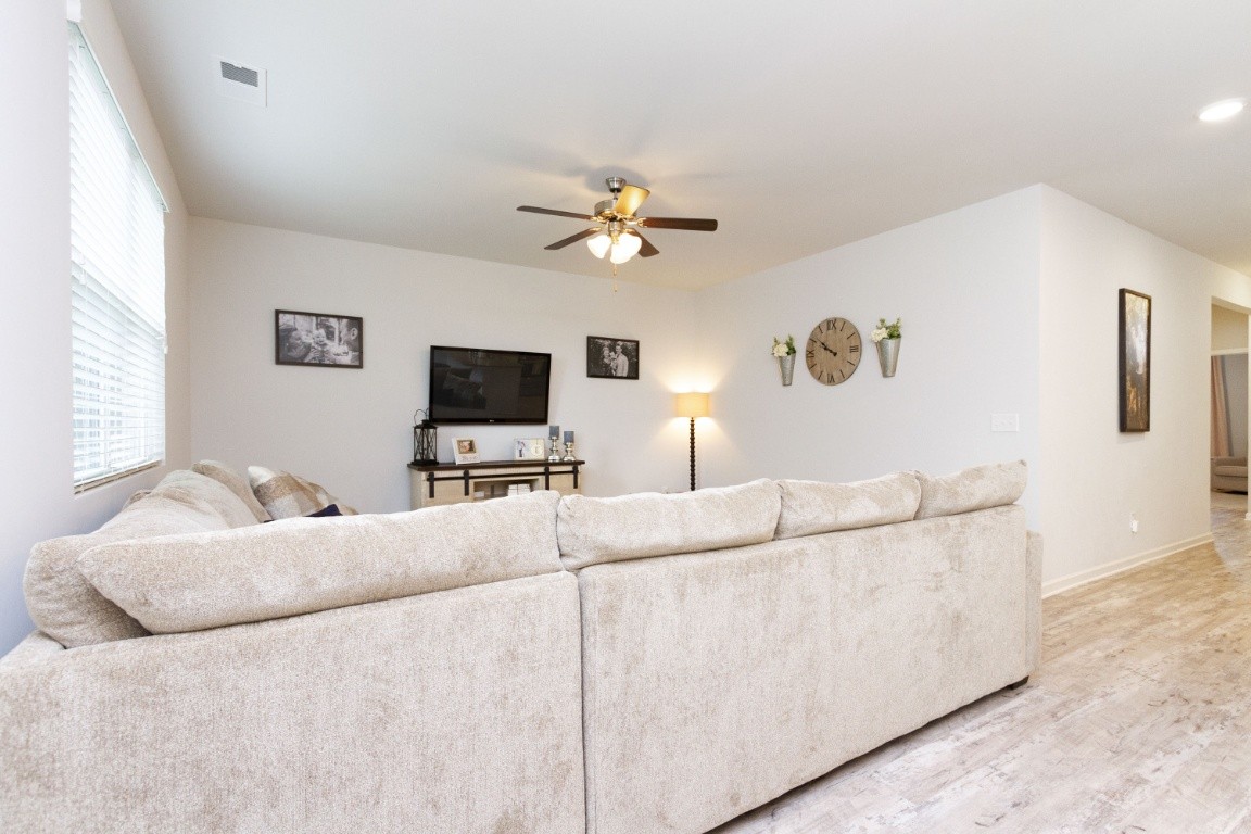 746 Prominence Road Columbia, TN 38401 - Photo 8 of 37 a living room with furniture and a flat screen tv