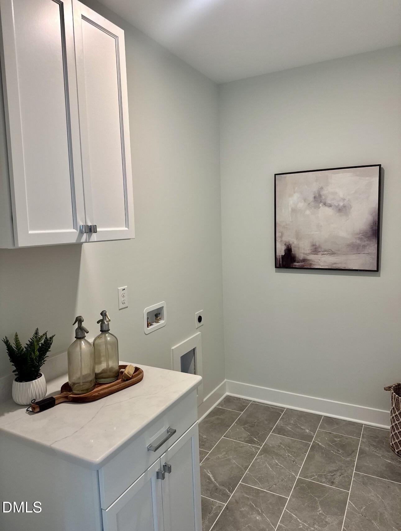 1057 Azalea Garden Circle Raleigh, NC 27603 - Photo 16 of 20 a room with storage and utility
