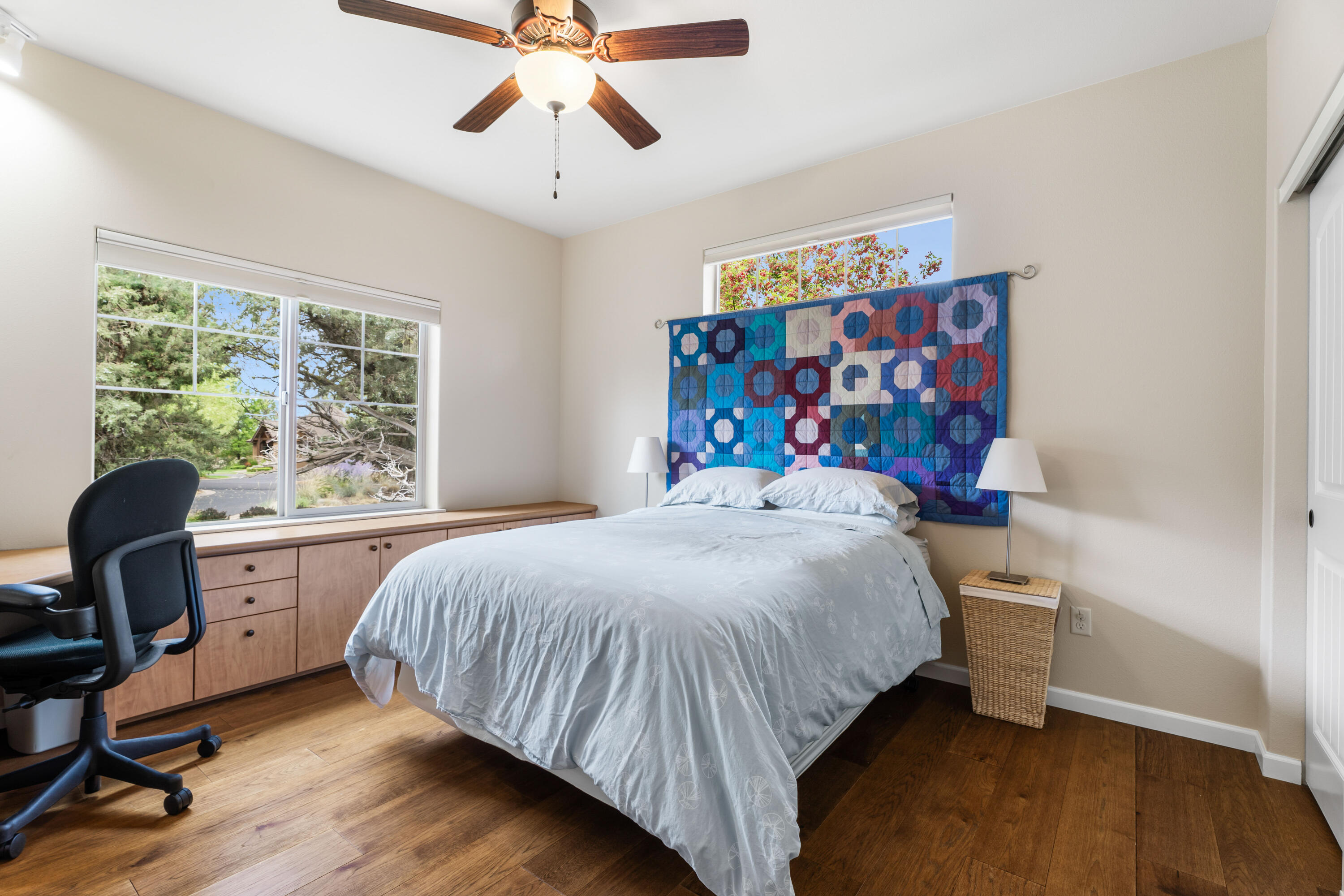 205 Vista Rim Drive Redmond, OR 97756 - Photo 20 of 85 a bedroom with a bed and a desk