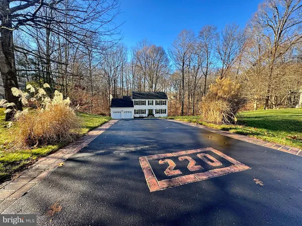 a view of a yard with swimming pool