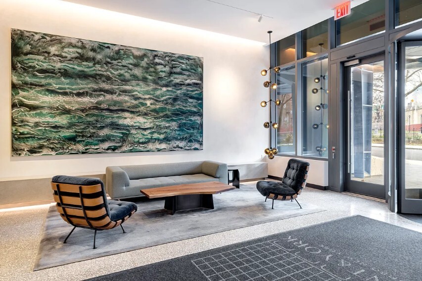 180 Front Street, Unit 9K Brooklyn, NY 11201 - Photo 12 of 15 a living room with furniture and a large window