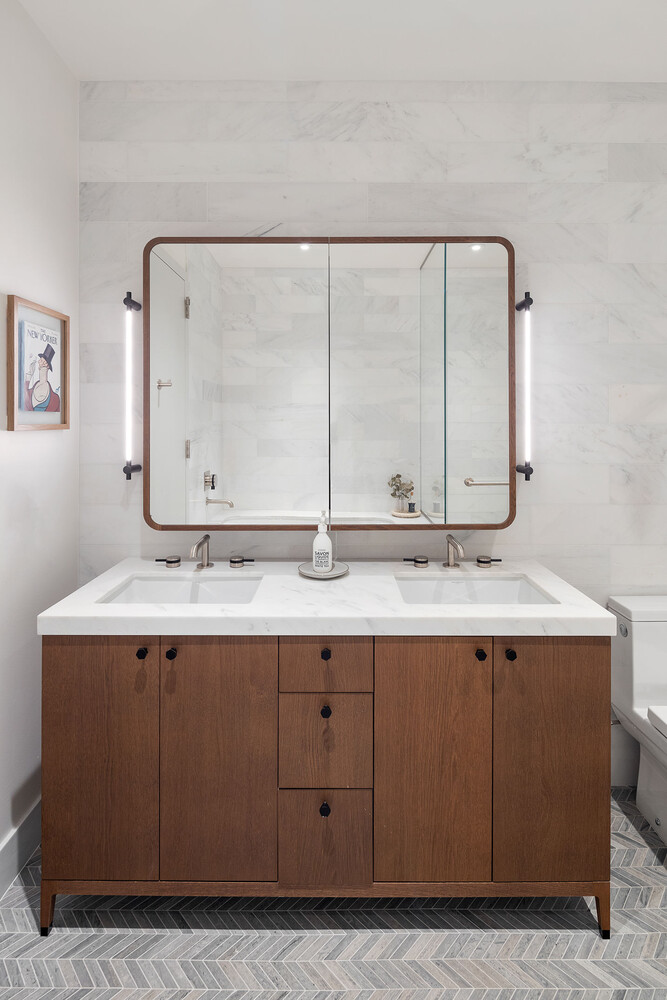 180 Front Street, Unit 9K Brooklyn, NY 11201 - Photo 9 of 15 a bathroom with a granite countertop sink and a mirror