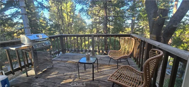 a view of a chairs on the roof deck