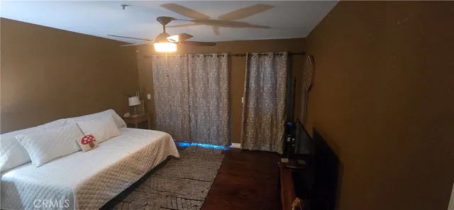 a bed room with a bed and a window