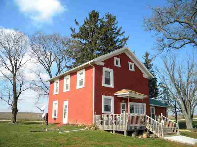 7789 North Coon Road Dakota, IL 61018 - Photo 1 of 10 a front view of a house with a yard