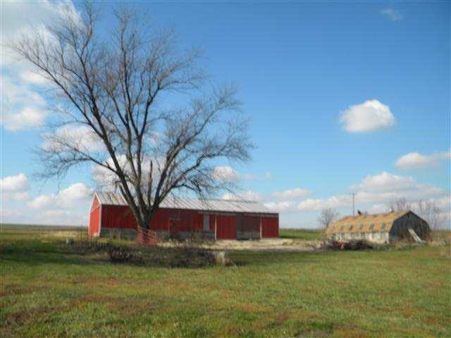 7789 North Coon Road Dakota, IL 61018 - Photo 2 of 10 a view of a big yard next to a building