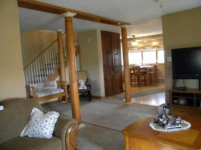 7789 North Coon Road Dakota, IL 61018 - Photo 8 of 10 a living room with furniture and a flat screen tv