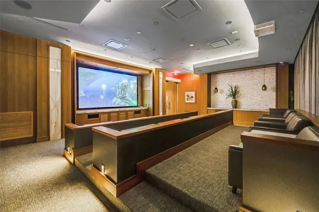 a room with furniture pool table and flat screen tv