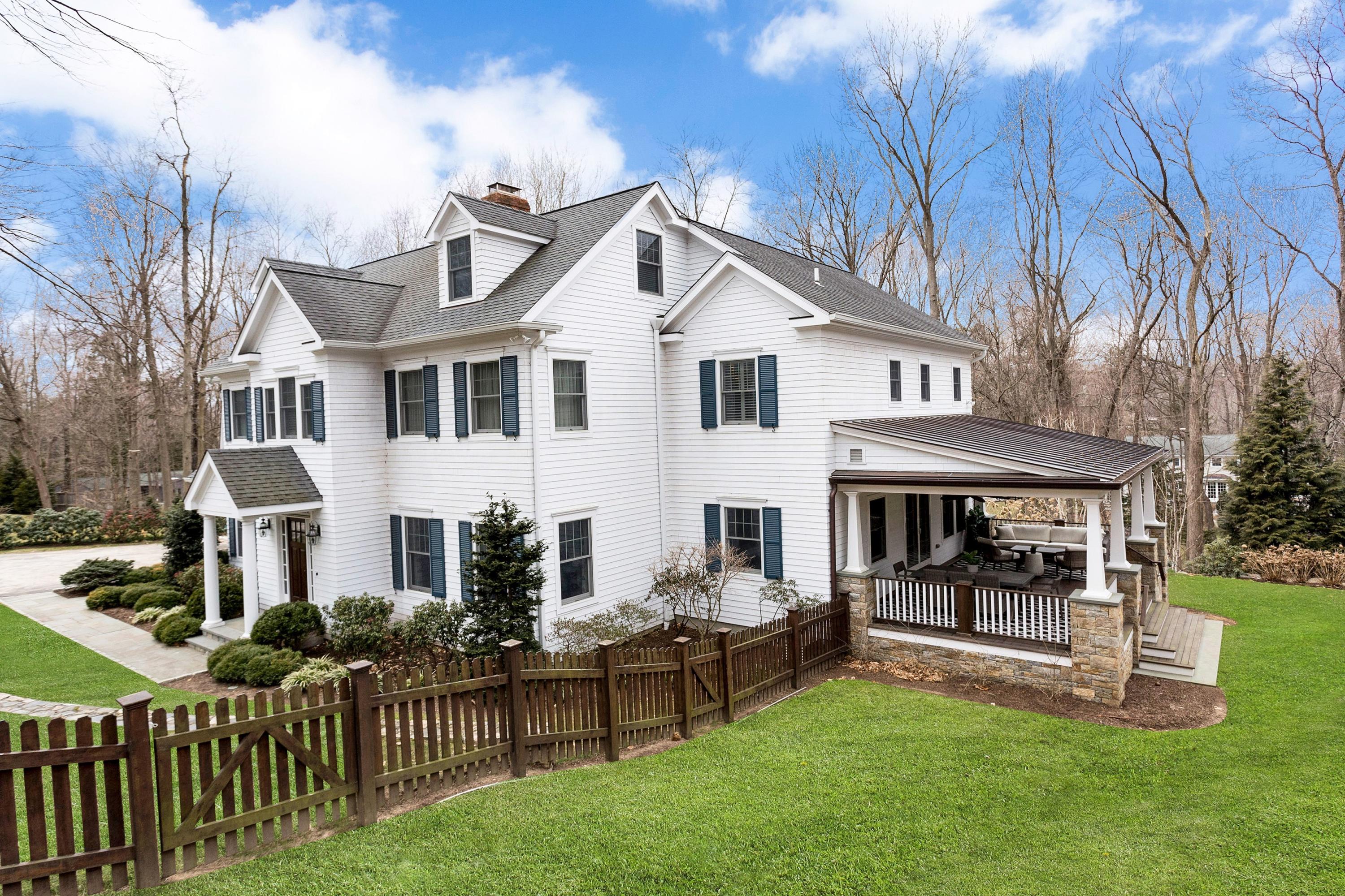 33 Briar Brae Road Darien, CT 06820 - Photo 2 of 37 a view of a house with a yard and furniture