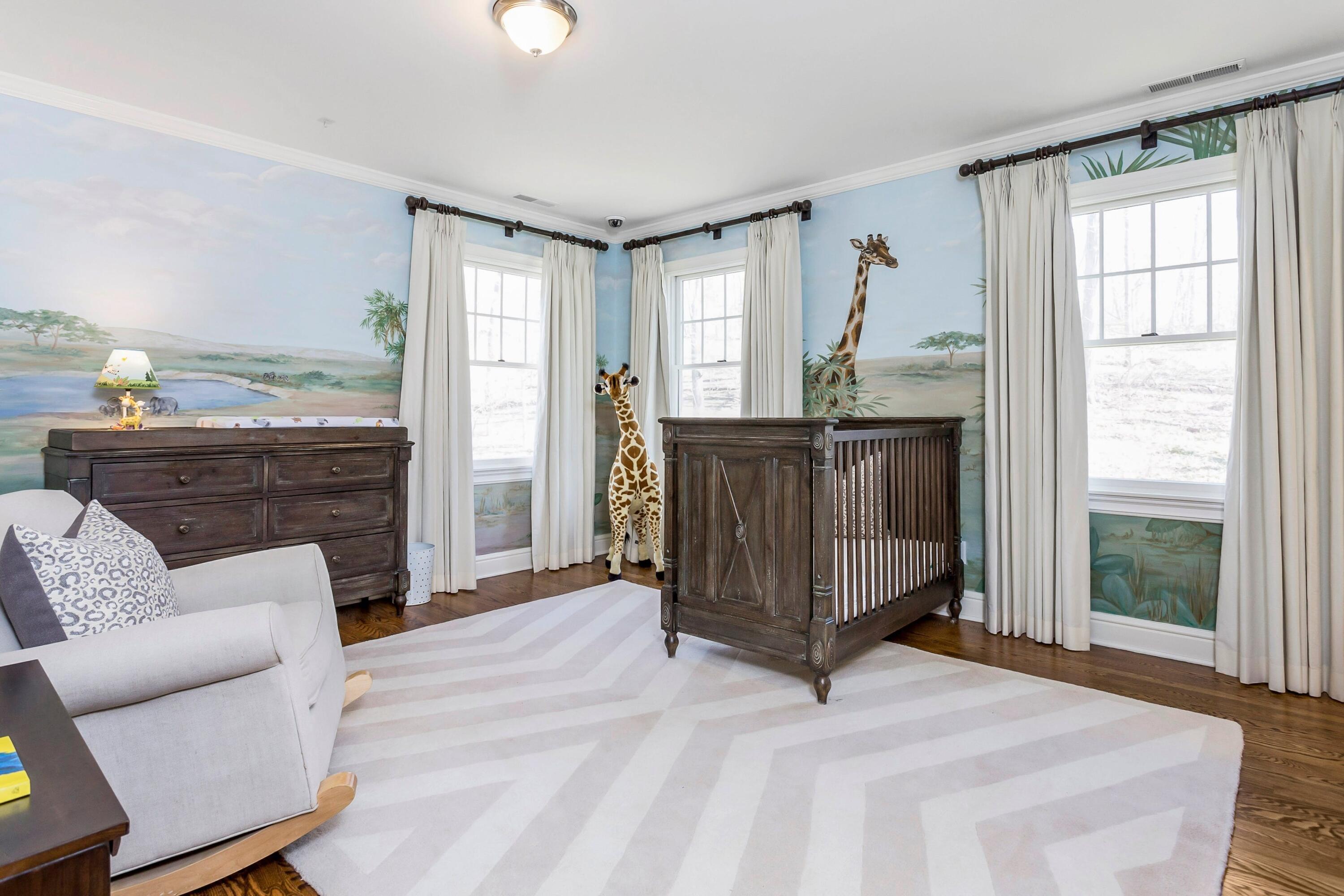 33 Briar Brae Road Darien, CT 06820 - Photo 18 of 37 a living room with furniture a fireplace and a large window