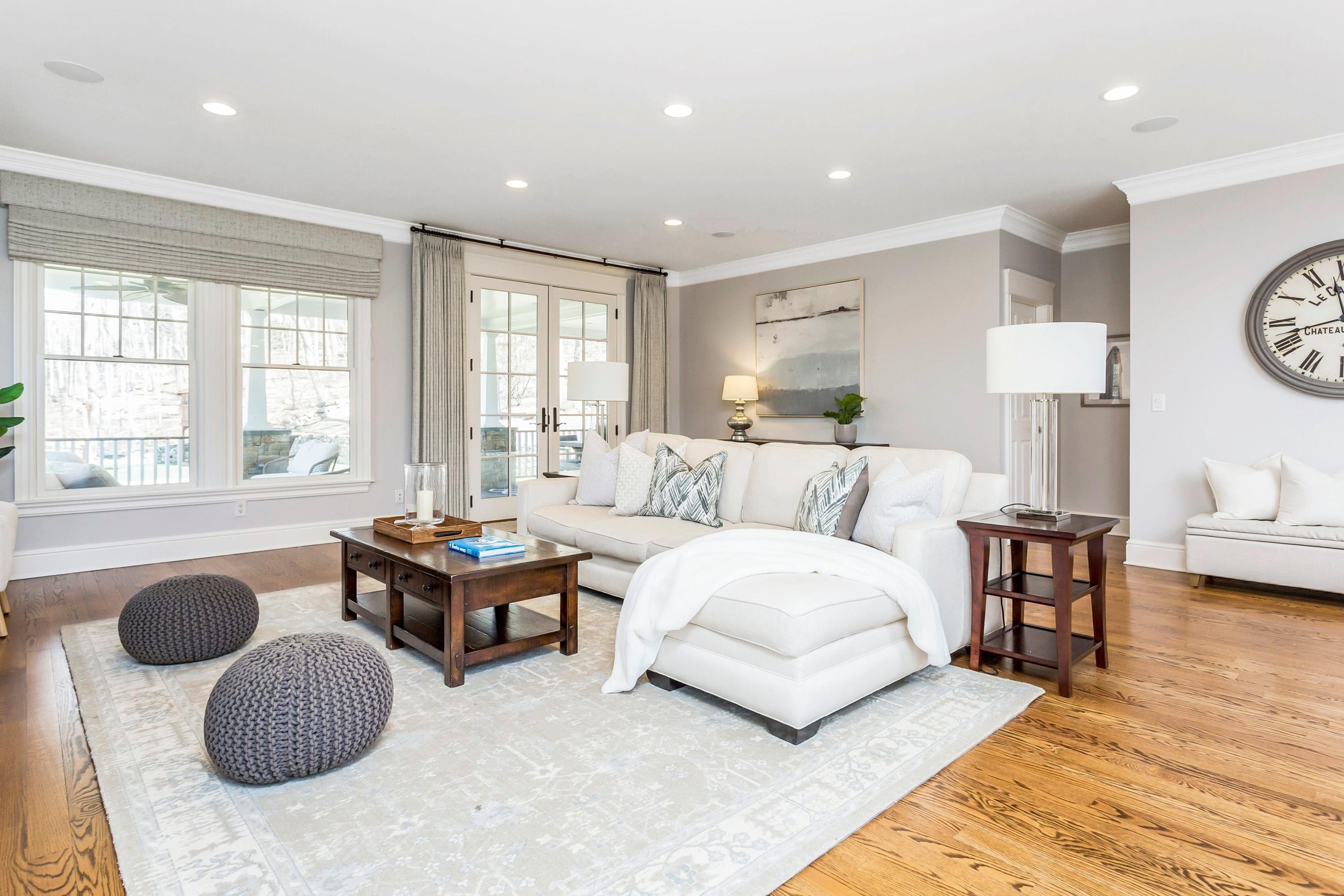 33 Briar Brae Road Darien, CT 06820 - Photo 4 of 37 a living room with furniture and a large window