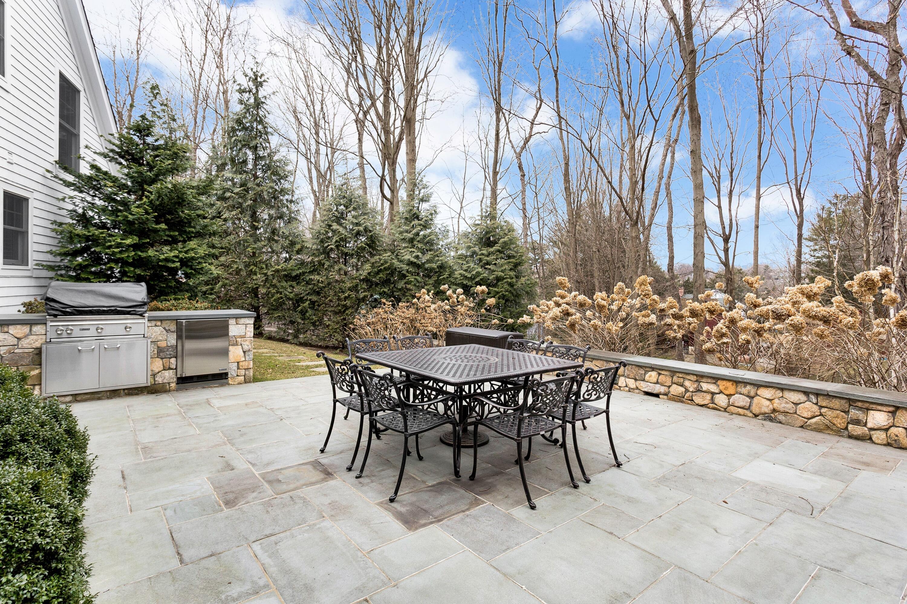 33 Briar Brae Road Darien, CT 06820 - Photo 36 of 37 a outdoor space with a table and chairs