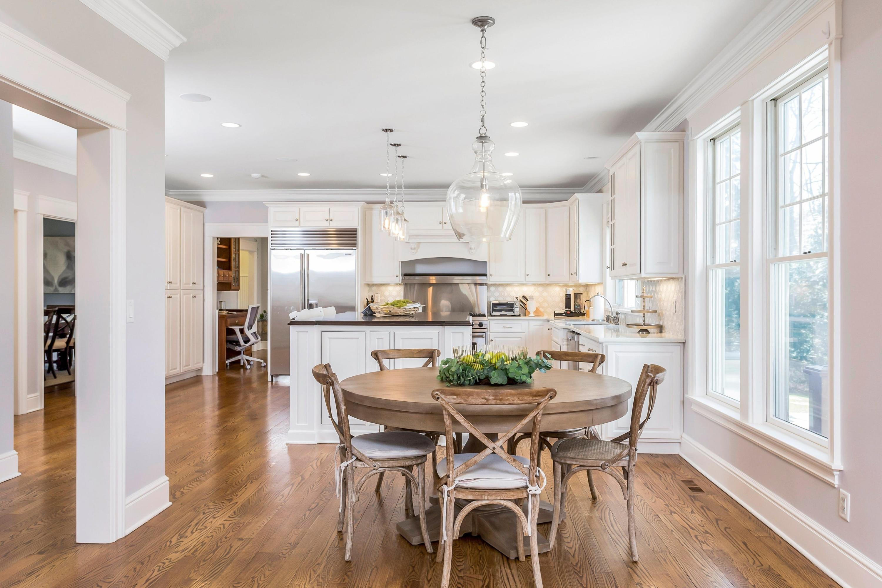 33 Briar Brae Road Darien, CT 06820 - Photo 9 of 37 a view of a dining room and livingroom with furniture wooden floor
