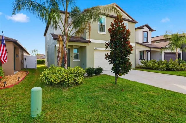 a house view with a garden space