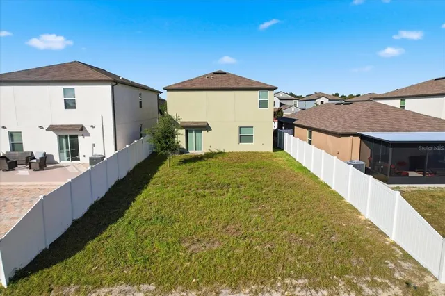a view of a house with a swimming pool