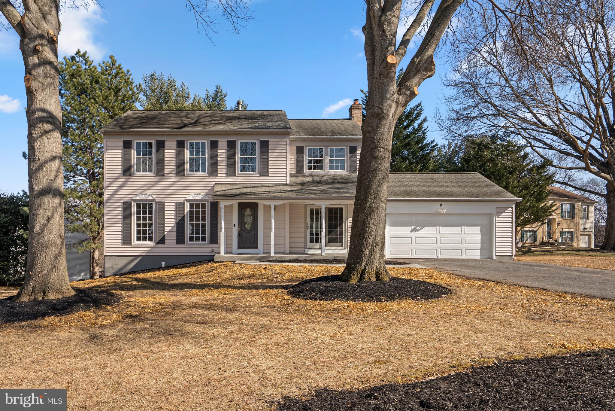 8 Seville Way Gaithersburg, MD 20878 - Photo 1 of 45 a front view of a house with a yard