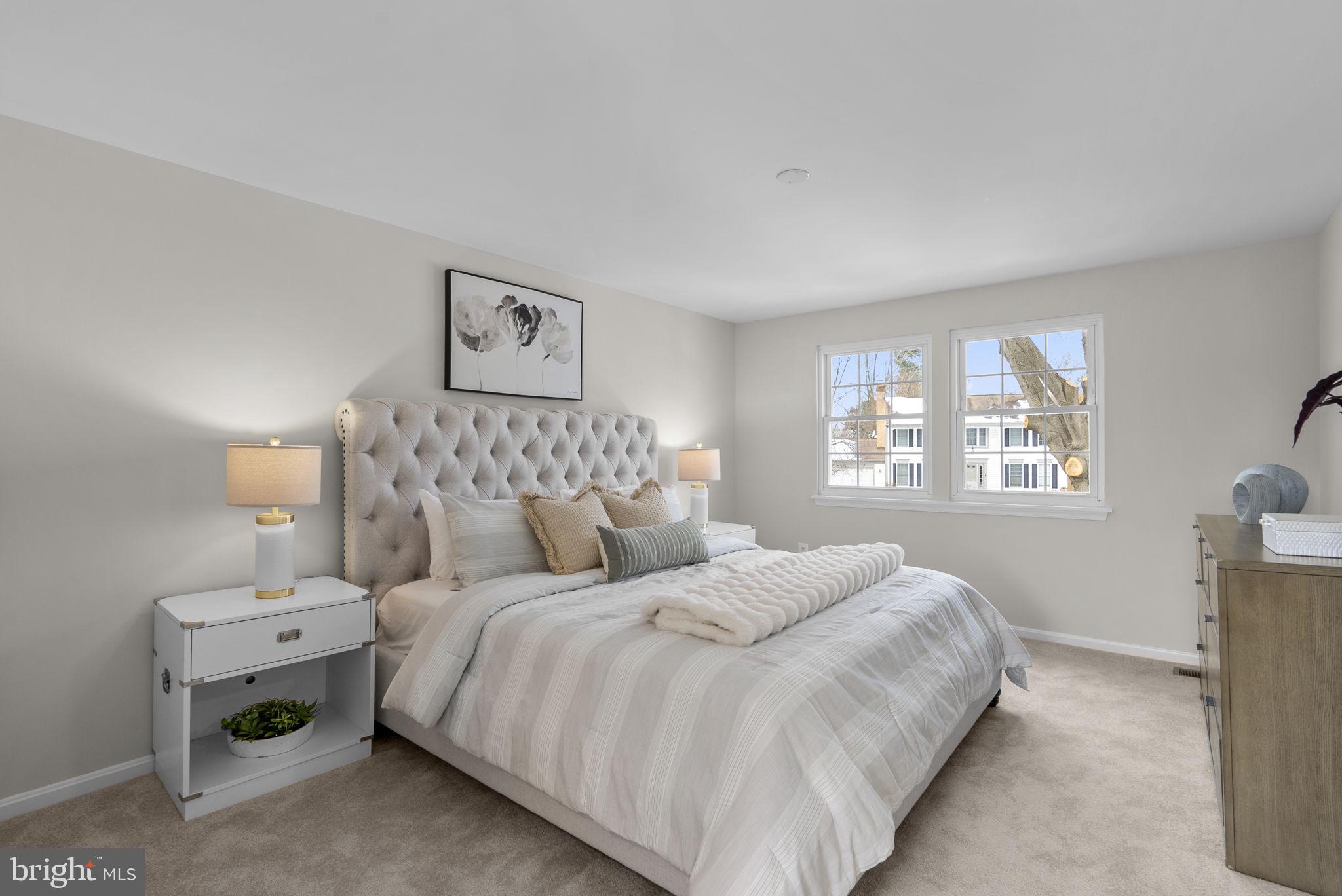 8 Seville Way Gaithersburg, MD 20878 - Photo 16 of 45 a bedroom with a bed and a window
